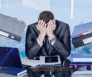 A,Businessman,Is,Sitting,At,His,Working,Place,In,The